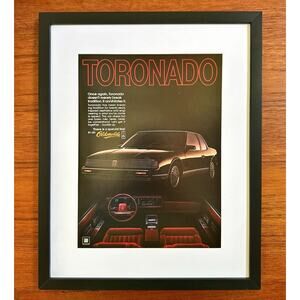 Framed 1986 Oldsmobile Toronado Vintage Ad "Doesn't Merely Break Tradition."